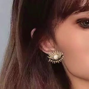 Bead and stones eyes earrings